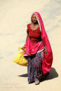 Tribal  lady  on  a  dusty  road  near  Pushkar. Rajistan. India