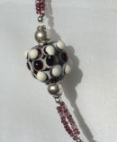 Black vanilla bead