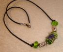 Green mauve lampworked glass bead..£28.00 (P1)
