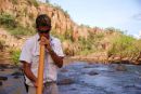 Shane Murphy-Henry plays the digeridoo at Nitmulik, Katherine Gorge NT - image published Outback magazine, Ghan story