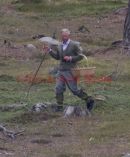 PICS SHOW;Prince Charles mushroom picking near loch muick Saturday afternoon prefering this ,rather than joining the rest of the royals on a grouse shoot on he moors near Corgarf Castle