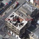 PICS SHOW;LONDON RIOT SITES.HIGH ST CROYDON WITH FIREMAN ON ROOFS