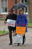 PIC SHOWS ;MAGGIE GEBBETT  PAYING  HER PARKING FIND IN COPPER COINS TO BROMLEY COUNCIL TODAY AT BROMLEY CIVIC CENTRE
