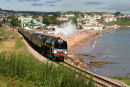 Torbay Express passing by Goodrington Sands, S. Devon