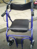 Walker with seat. Can be used as a temporary wheelchair