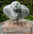 'Man becoming owl', serpentine & bronze(mahogany base), 23 x 24 x 9 cm