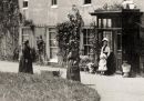 People in front of Mrs Neve's Farmhouse 