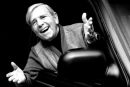 Norman Wisdom.