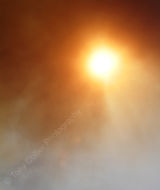 Smoke against the setting sun