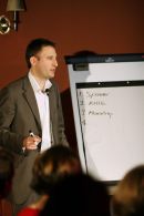Rob teaches the audience how to memorise a long list of words that they make up during the show.